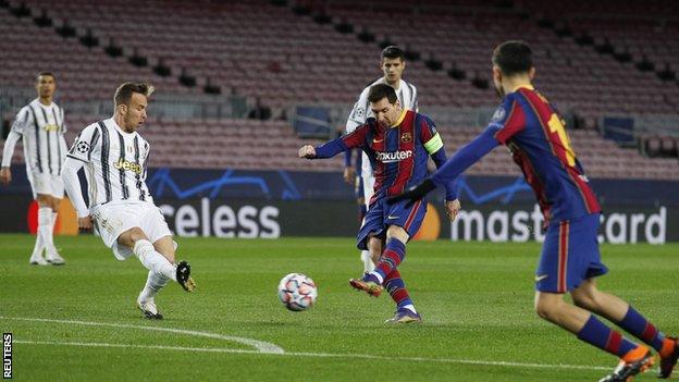Barcelona forward Lionel Messi has a shot in a Champions League group game against Juventus