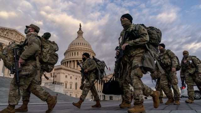 Two national guard members who made extremist statements about Biden inauguration removed with 10 others following findings during FBI screenings 