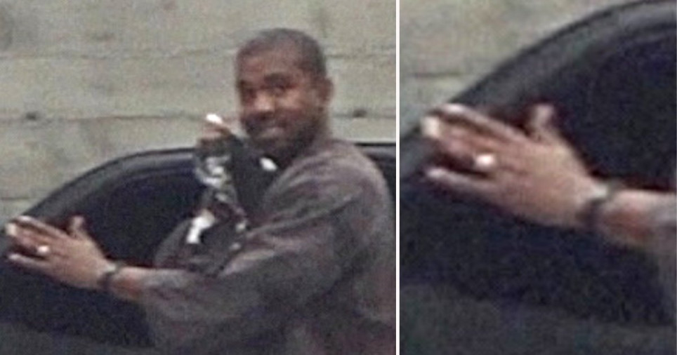 Kanye West all smiles as he?s pictured still wearing his wedding ring after Kim Kardashian filed for divorce (photos)
