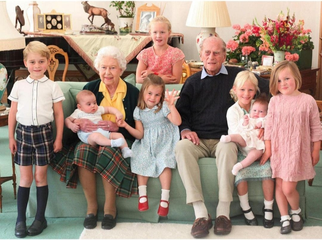 Royal family release unseen pictures of Prince Philip and Queen Elizabeth surrounded by their great-grandchildren 