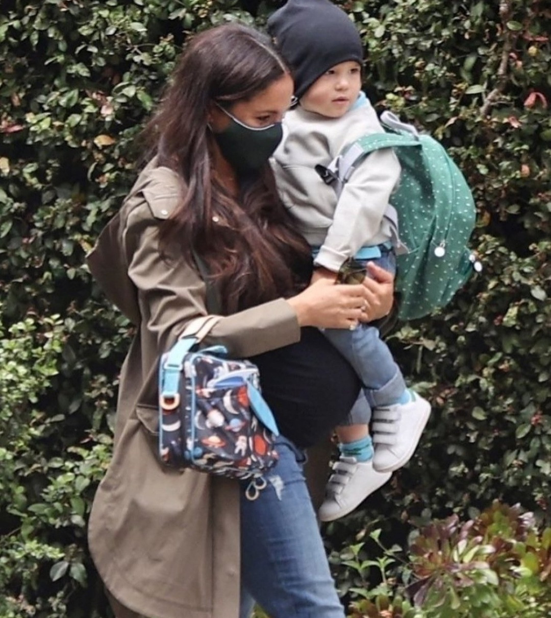Heavily pregnant Meghan Markle pictured taking son Archie to school (photos)
