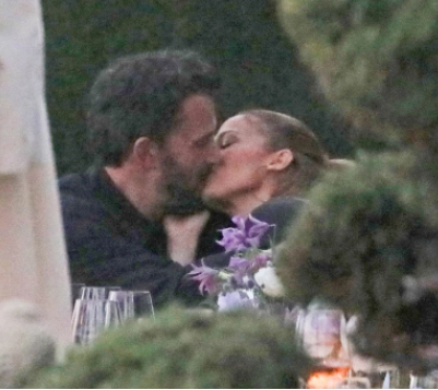 Jennifer Lopez and Ben Affleck seen kissing a dinner party after reuniting