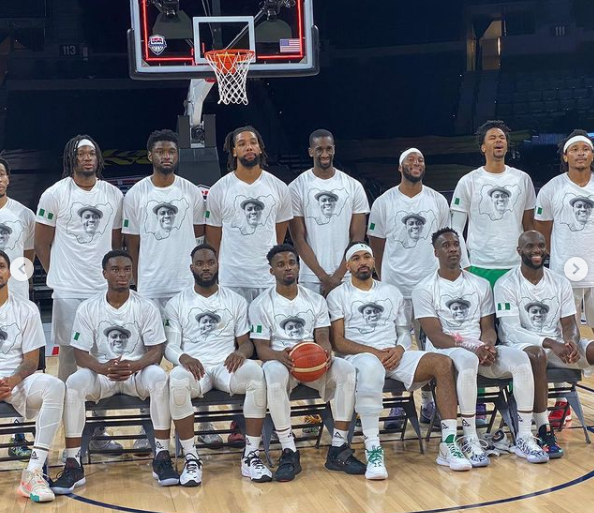 Nigerian Basketball team honor Sound Sultan with a warmup shirt that has his face before their pre-Olympics match against Australia (video)