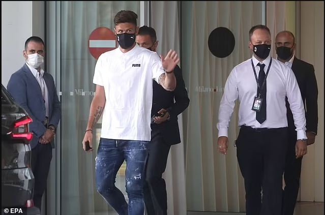 Chelsea striker Olivier Giroud arrives in Italy ahead of ?1m move to AC Milan (photos)