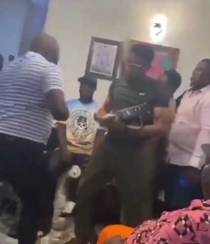 Guests throw bundles of money at each other at Obi Cubana