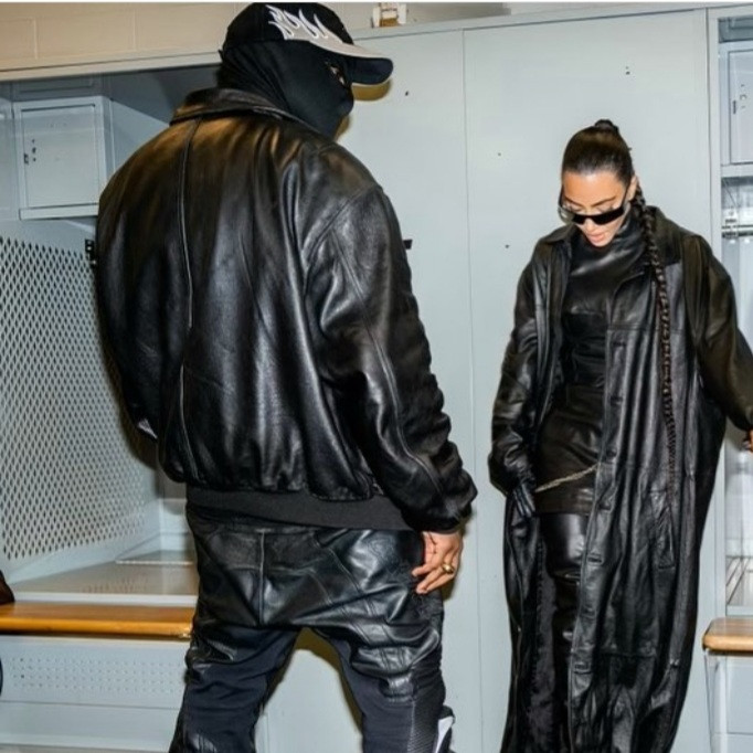Kim Kardashian pictured getting cozy with Kanye West backstage at his Donda listening party (photos)