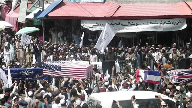 Taliban organize street carnival celebrating US withdrawal from Afghanistan with coffins draped with American flags (photos)