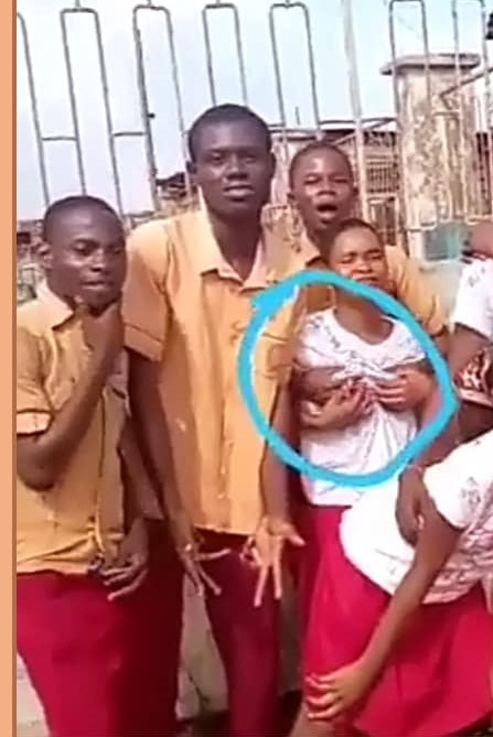 Secondary school student grabs his female classmate