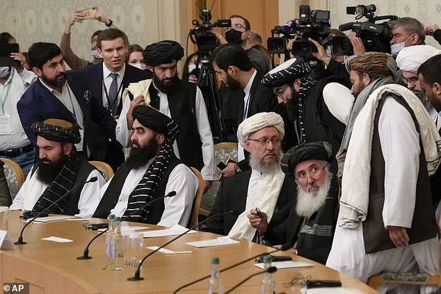Taliban leaders are welcomed in Moscow as Russia seeks to exert influence over region (photos)