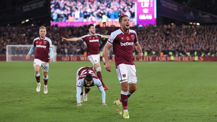 West Ham players, led by goalscorer Pablo Fornals, celebrate after retaking the lead against Liverpool