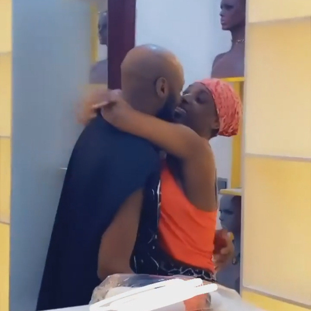 Annie Idibia jumps on husband Tuface and kisses him as he pays her a visit at work (video)