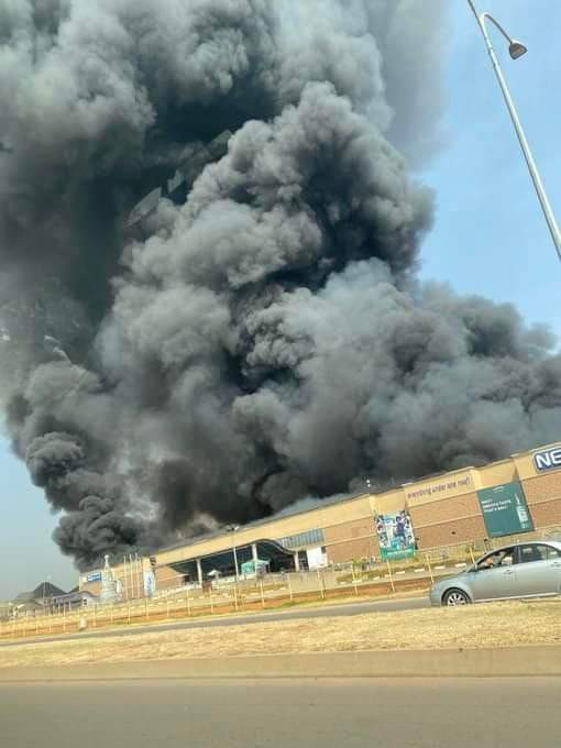 Properties worth millions of Naira destroyed as fire razes popular supermarket in Abuja (photo/video)