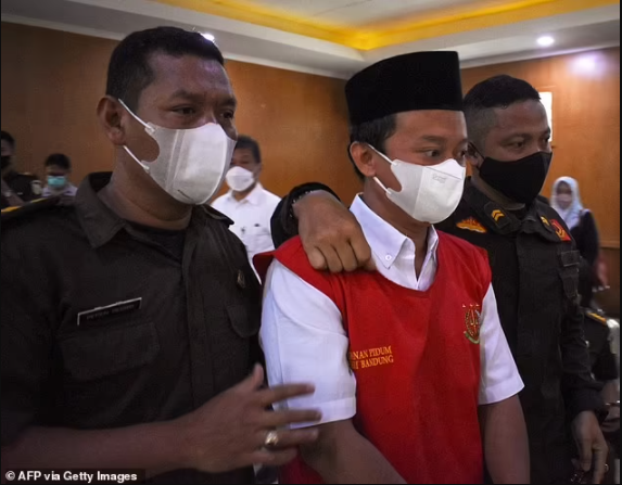 Islamic school teacher who raped 13 students as young as 12 leaving eight pregnant now faces the death penalty after his life sentence was upgraded (photos)