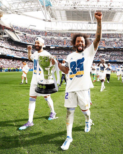 Marcelo and Benzema doing a lap for the 35th La Liga trophy