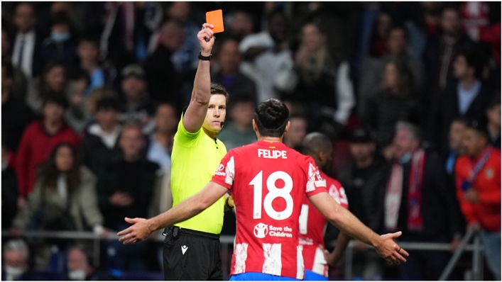 Atletico Madrid's Felipe receives a red card against Manchester City