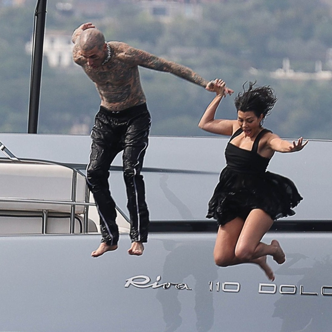 Kourtney Kardashian and Travis Barker enjoy romantic day on luxury yacht as they honeymoon in Italy