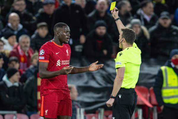 LIVERPOOL, ENGLAND - Wednesday, November 24, 2021: Liverpool's Ibrahima Konaté is shown a yellow card by referee Felix Zwayer during the UEFA Champions League Group B Matchday 5 game between Liverpool FC and FC Porto at Anfield. (Pic by David Rawcliffe/Propaganda)