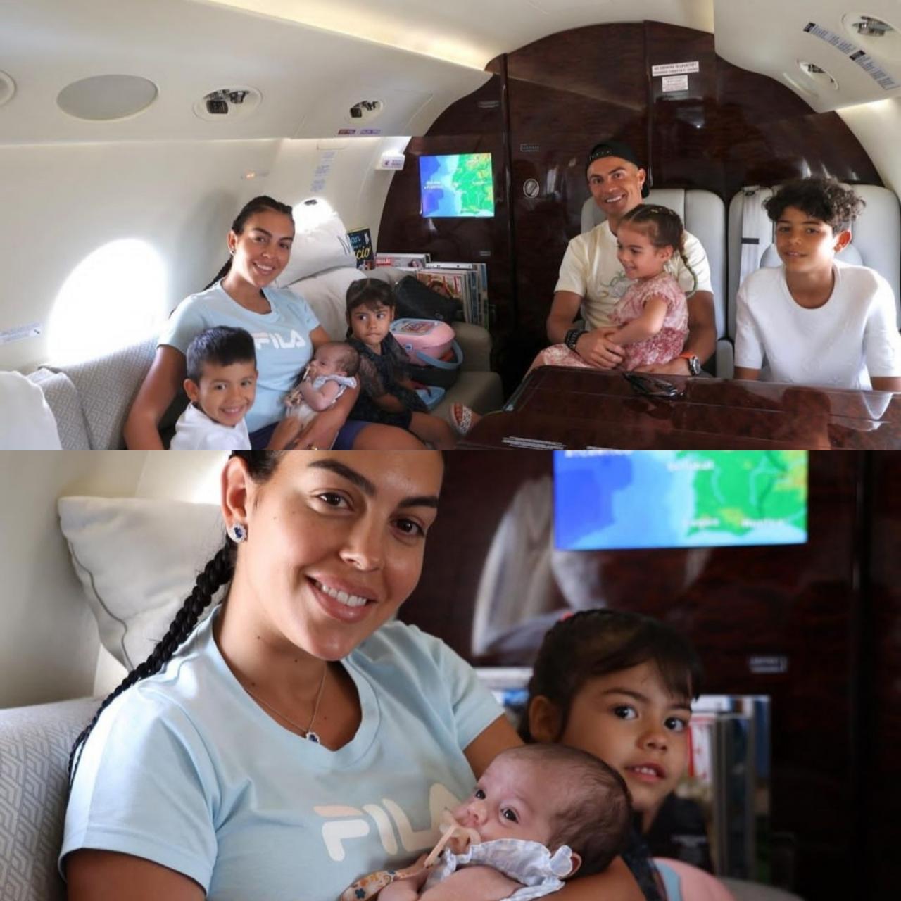 Georgina Rodriguez cradles baby Bella as she jets off on holiday with Cristiano Ronaldo and their kids