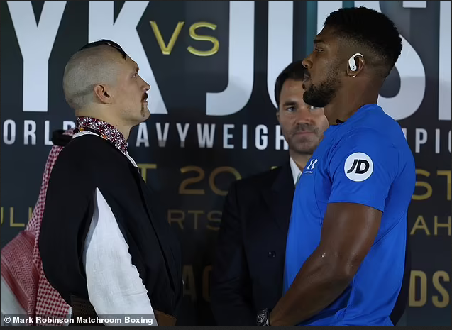 Oleksandr Usyk and  Anthony Joshua face off in Saudi Arabia ahead of their rematch (photos)