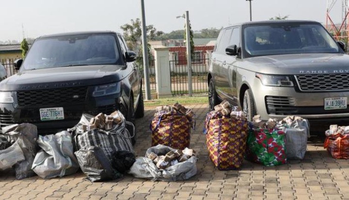Sacks of Cash and Vehicles recovered from suspects