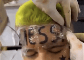 Football Fan Tattoos “Messi” On His Forehead After World Cup Win
