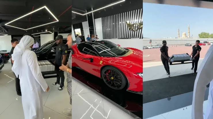 UAE orders arrest of man filmed flamboyantly buying luxury cars while people carried money for him (Video)