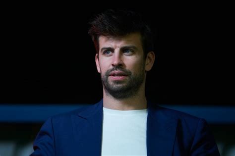 Former Barcelona star Gerard Pique falls off stage at an event