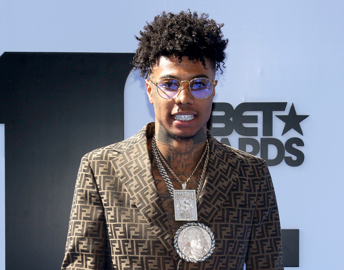 Rapper Blueface throws female fan off stage