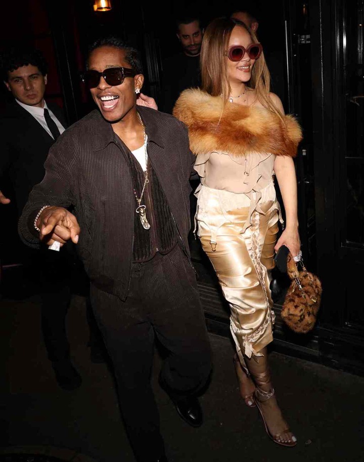 Rihanna and A$AP Rocky walking to Valentine's Day date.