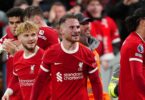 Liverpool’s Alexis Mac Allister (centre) celebrates scoring their side’s second goal of the game with team-mates during the Premier League match at Anfield, Liverpool. Picture date: Thursday April 4, 2024.